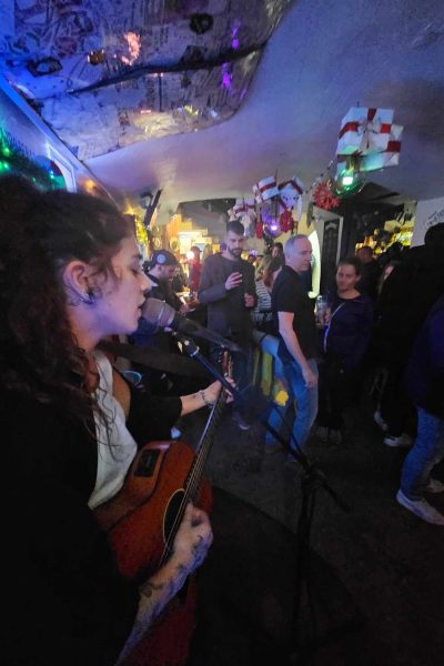 Lady Singing to Crowd